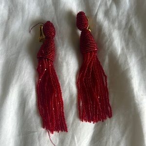 Oscar de la renta earrings- Clip On-has loose strings some beads have fallen off